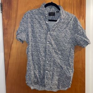 Black and brown button down